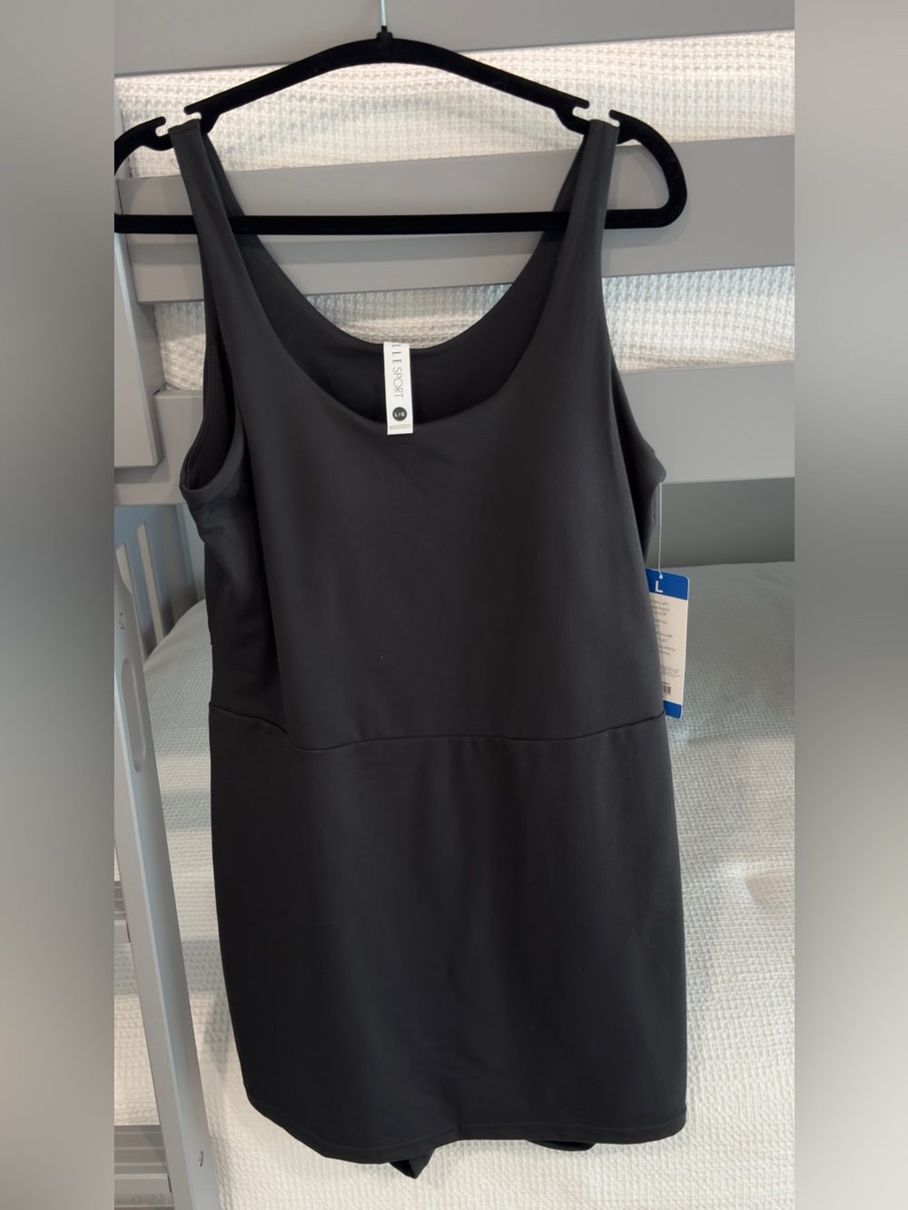 NWT’S Elle Sport tank dress/active wear with built in shorts and bra.